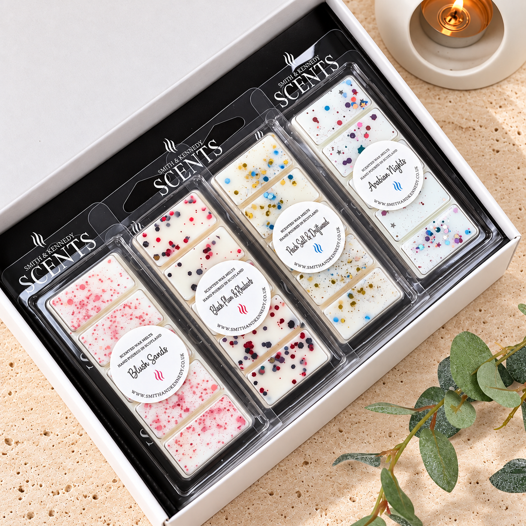 Luxe Wax Melt Collection by Smith & Kennedy Scents, with four labelled wax melt snap bars in a white gift box with a black liner.