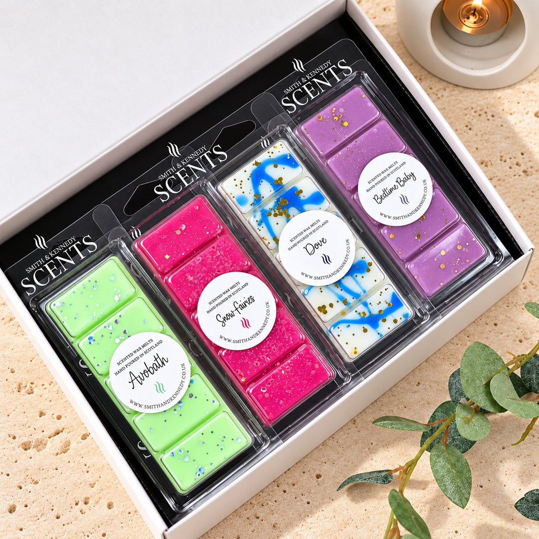 Bath &amp; Body Wax Melt Collection by Smith &amp; Kennedy Scents: Avobath, Snow Fairies, Dove and Bedtime Baby snap bars in a white gift box.