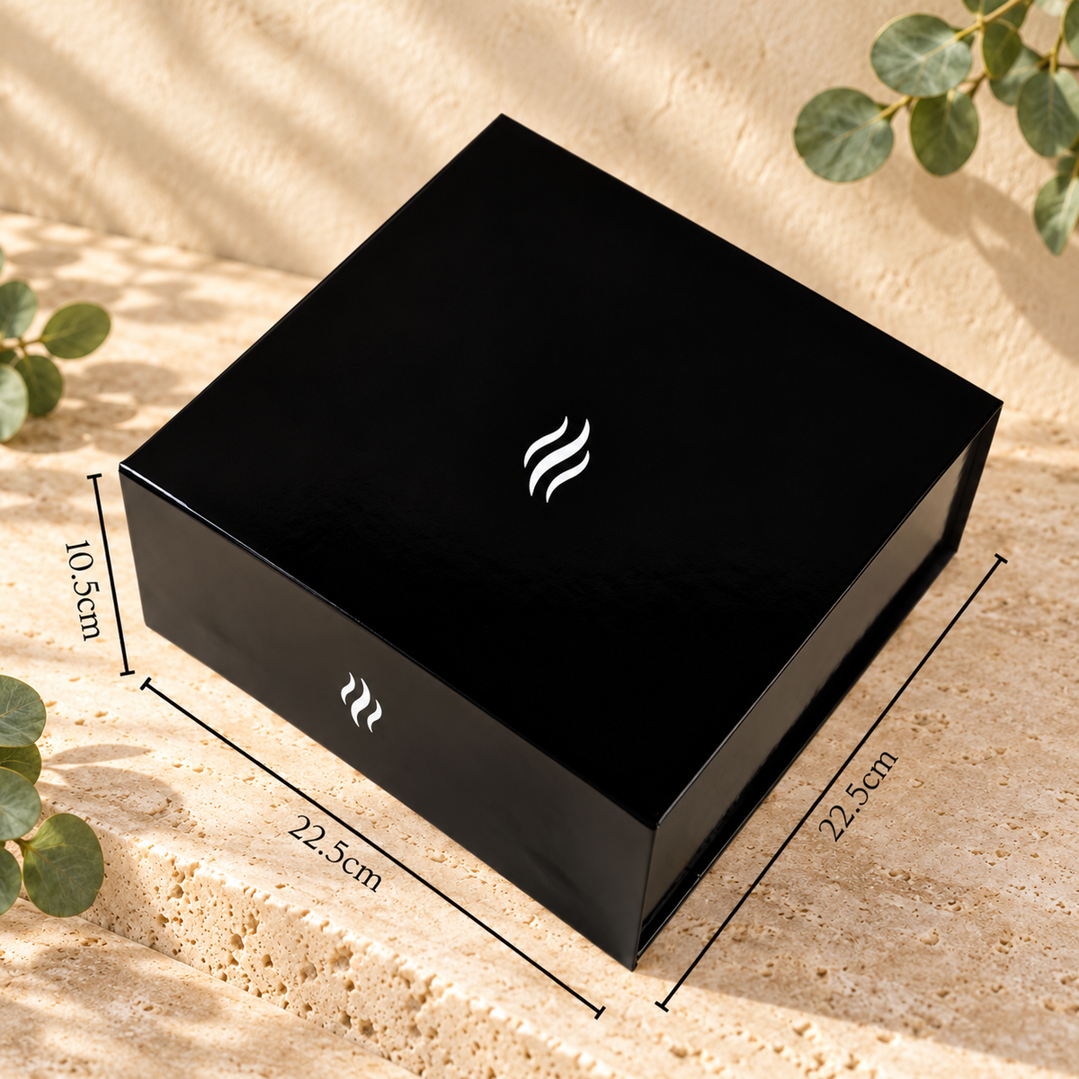 Smith & Kennedy Scents black magnetic wax melt storage box with white flame branding, measuring 22.5cm by 22.5cm by 10.5cm.