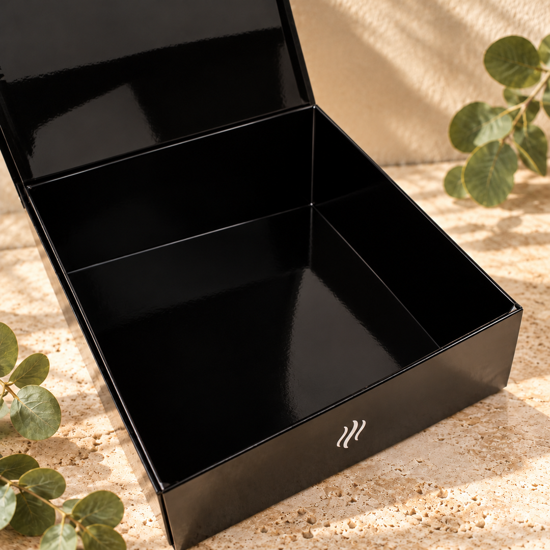 Open Smith &amp; Kennedy Scents black magnetic storage box showing the empty interior and hinged lid.