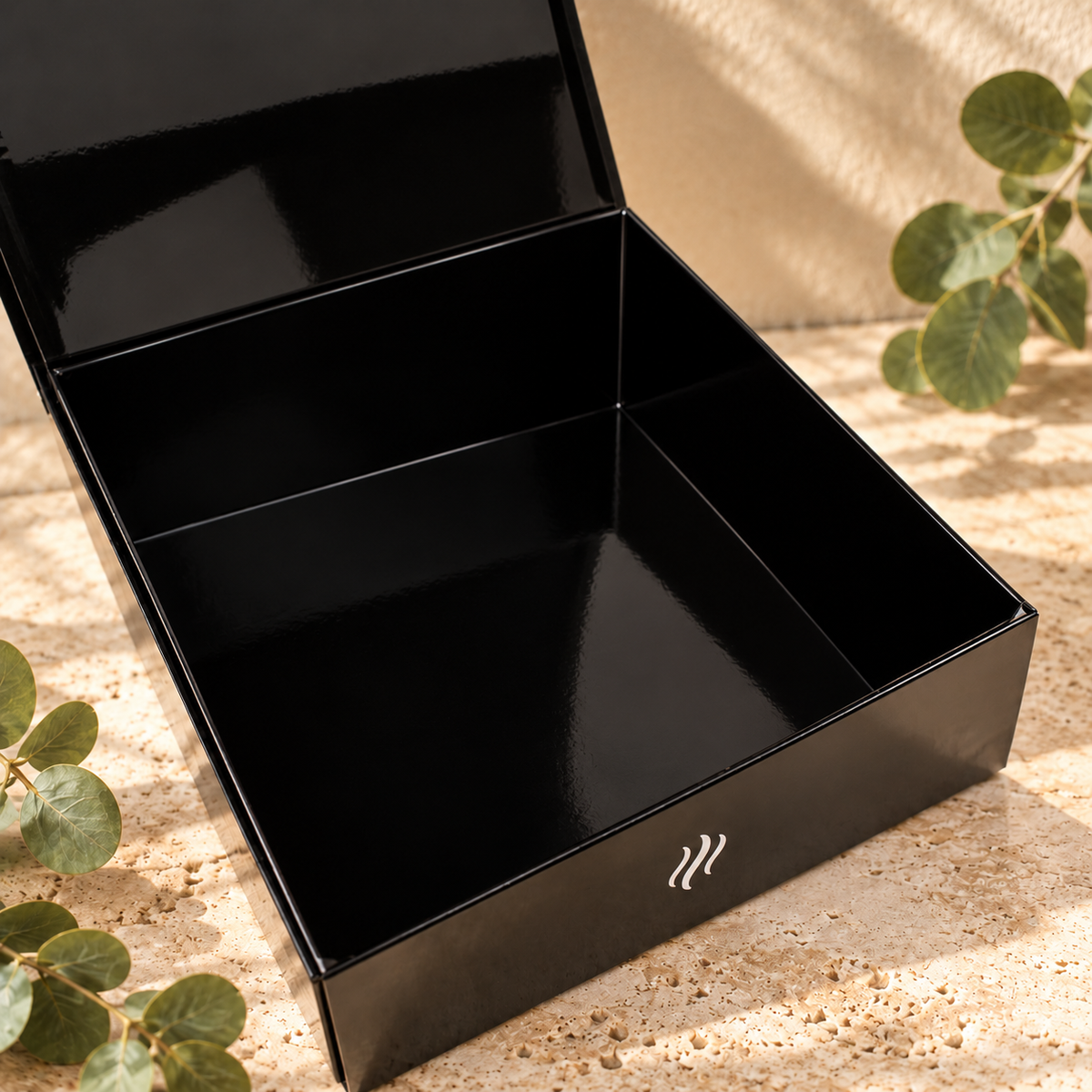 Open Smith & Kennedy Scents black magnetic storage box showing the empty interior and hinged lid.