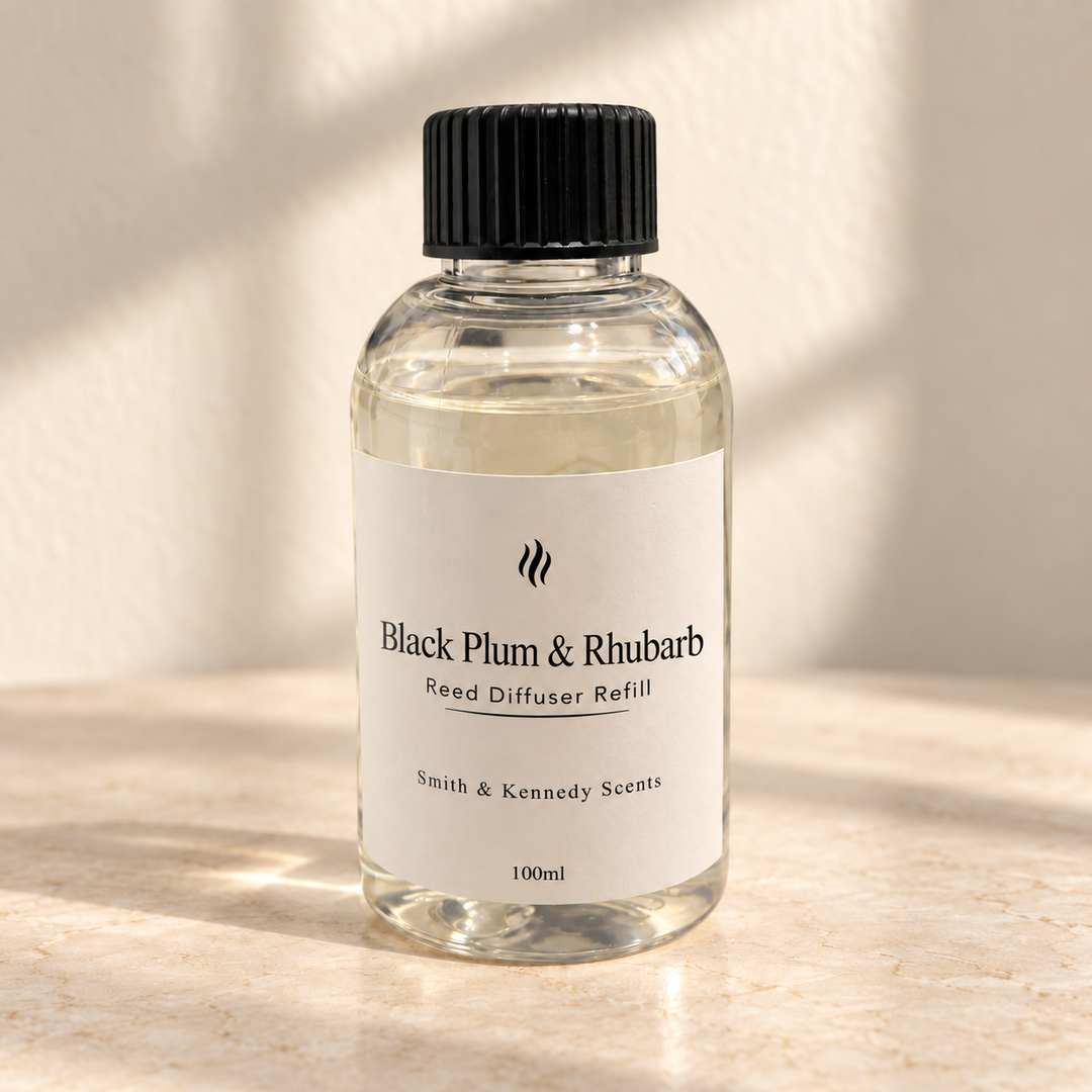 Black Plum &amp; Rhubarb 100ml reed diffuser refill bottle with black screw cap and portrait label