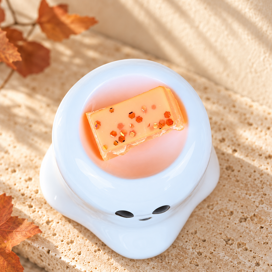 Overhead close-up of the white Boo ghost wax melt burner&
