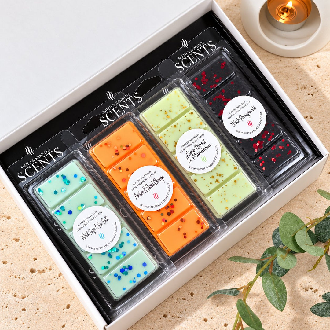Inspired By Jo Malone Wax Melt Collection by Smith &amp; Kennedy Scents: Wood Sage &amp; Sea Salt, Amber &amp; Sweet Orange, Lime Basil &amp; Mandarin and Black Pomegranate snap bars in a white gift box.