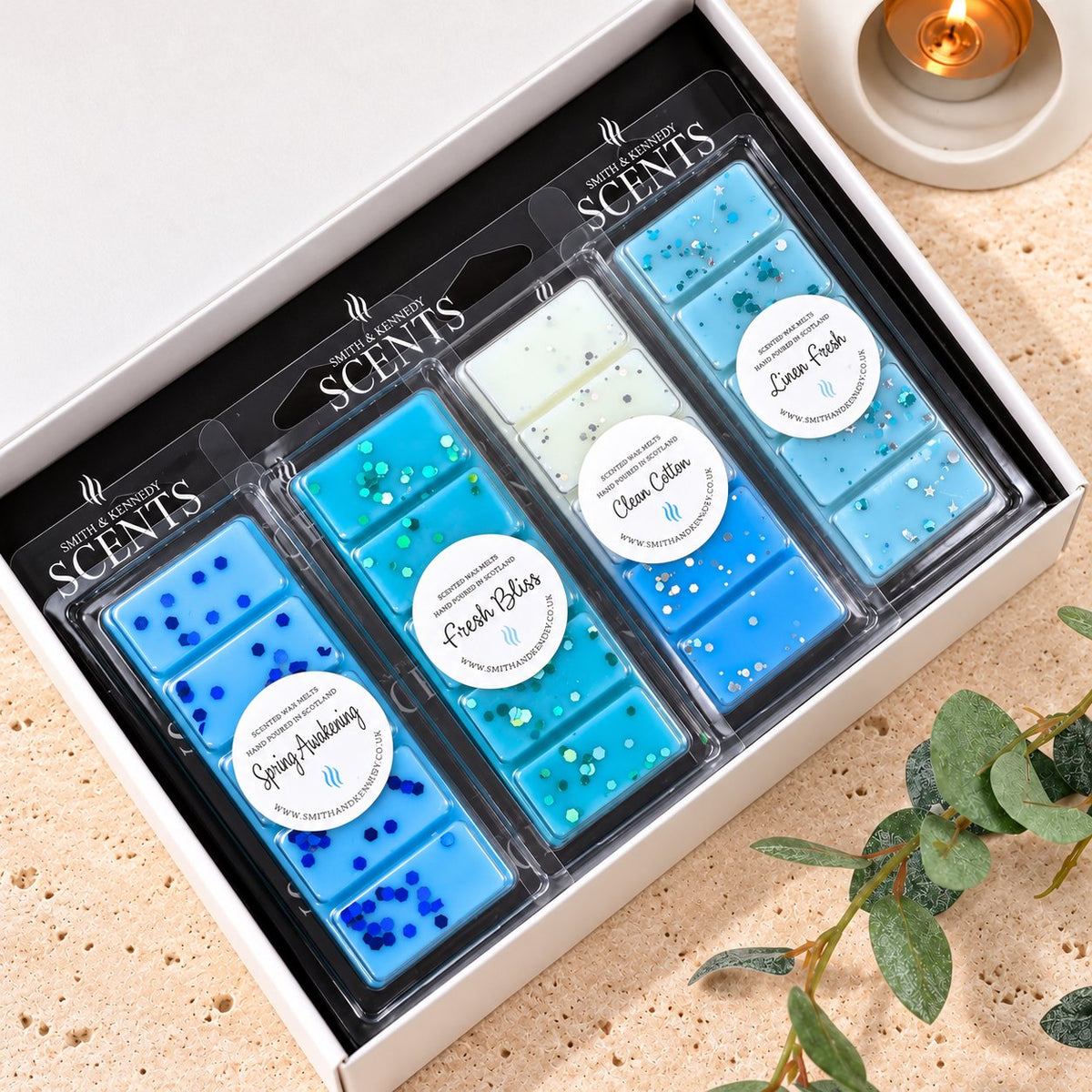 Laundry Wax Melt Collection by Smith & Kennedy Scents: Spring Awakening, Fresh Bliss, Clean Cotton and Linen Fresh snap bars in a white gift box.