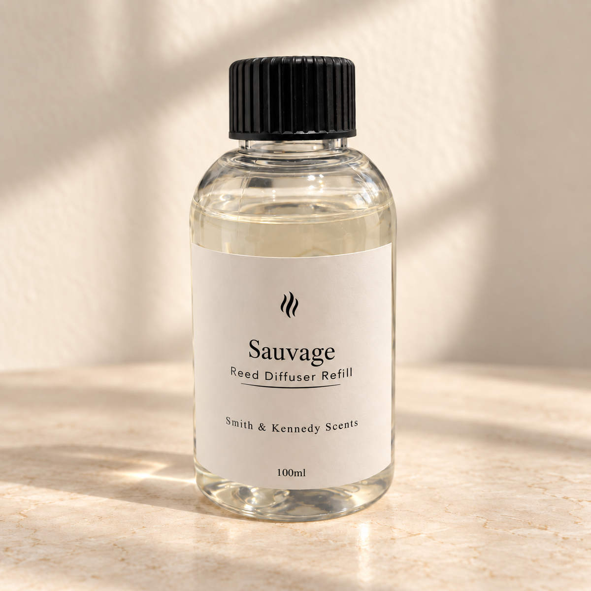 Sauvage 100ml reed diffuser refill bottle with black screw cap and portrait label