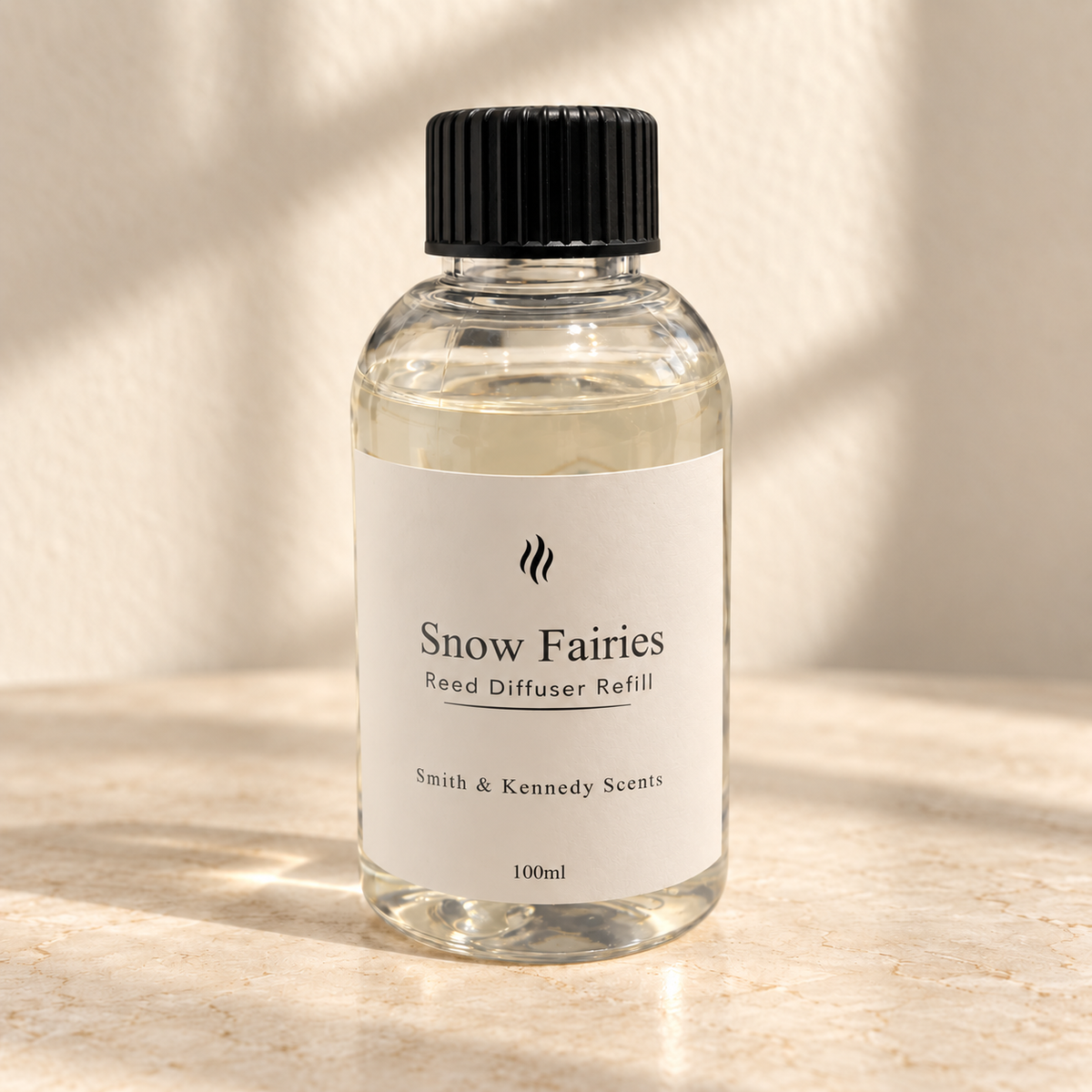Snow Fairies 100ml reed diffuser refill bottle with black screw cap and portrait label