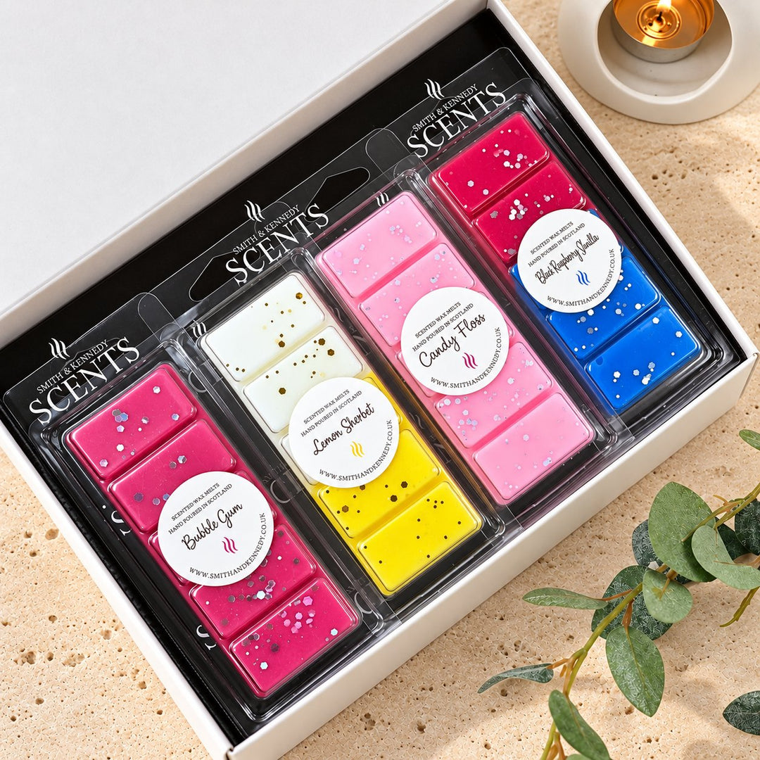 Sweet Wax Melt Collection by Smith &amp; Kennedy Scents: Bubble Gum, Lemon Sherbet, Candy Floss and Blue Raspberry Slushie snap bars in a white gift box.