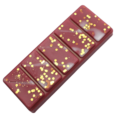 Home Sweet Home Wax Melt Snap Bar - perfect for creating a warm and inviting atmosphere in any room with its unique blend of warm cinnamon, cloves, ginger, iced coconut, and raisins